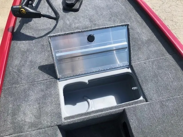 Slide: The Image of 2024 Tracker Pro 170 boat storage compartment with open lid. - 11