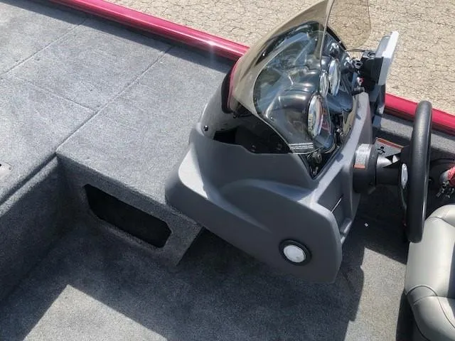 Slide: The Image of 2024 Tracker Pro 170 boat dashboard and seating area. - 13