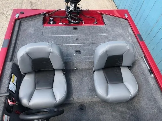 Slide: The Image of 2024 Tracker Pro 170 boat interior with two gray seats. - 15