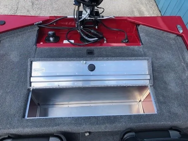 Slide: The Image of 2024 Tracker Pro 170 boat interior with storage compartment and control panel. - 19