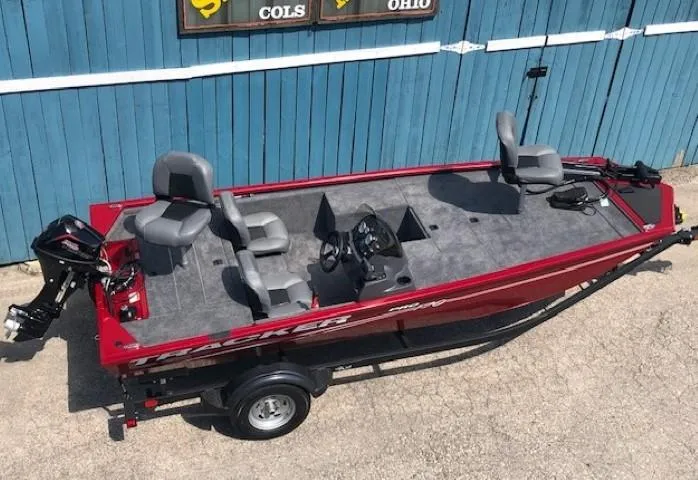 Slide: The Image of 2024 Tracker Pro 170 fishing boat with red exterior and gray interior. - 6