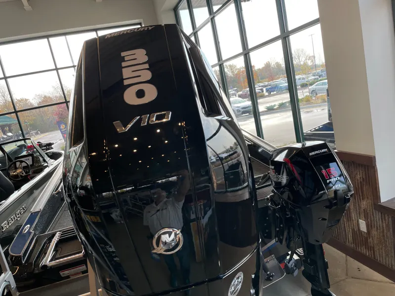 Slide: The Image of 2024 Nitro ZV21 boat with Mercury 350 V10 engine displayed indoors. - 3