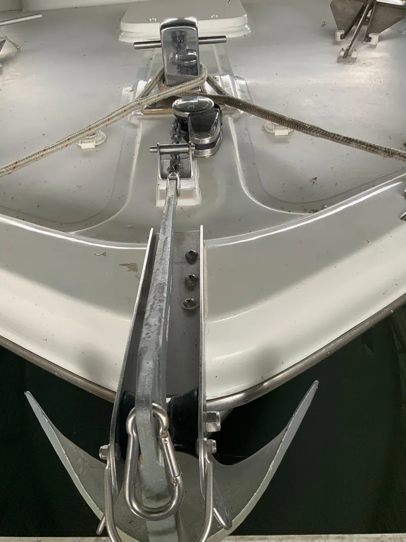 Slide: The Image of Bow of 1969 Hatteras 41 Double Cabin with anchor and mooring lines. - 13