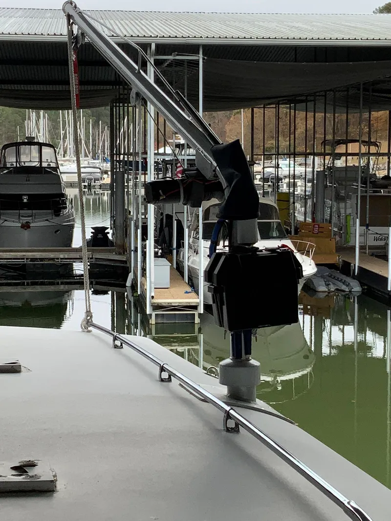 Slide: The Image of 1969 Hatteras 41 Double Cabin docked at a marina. - 21