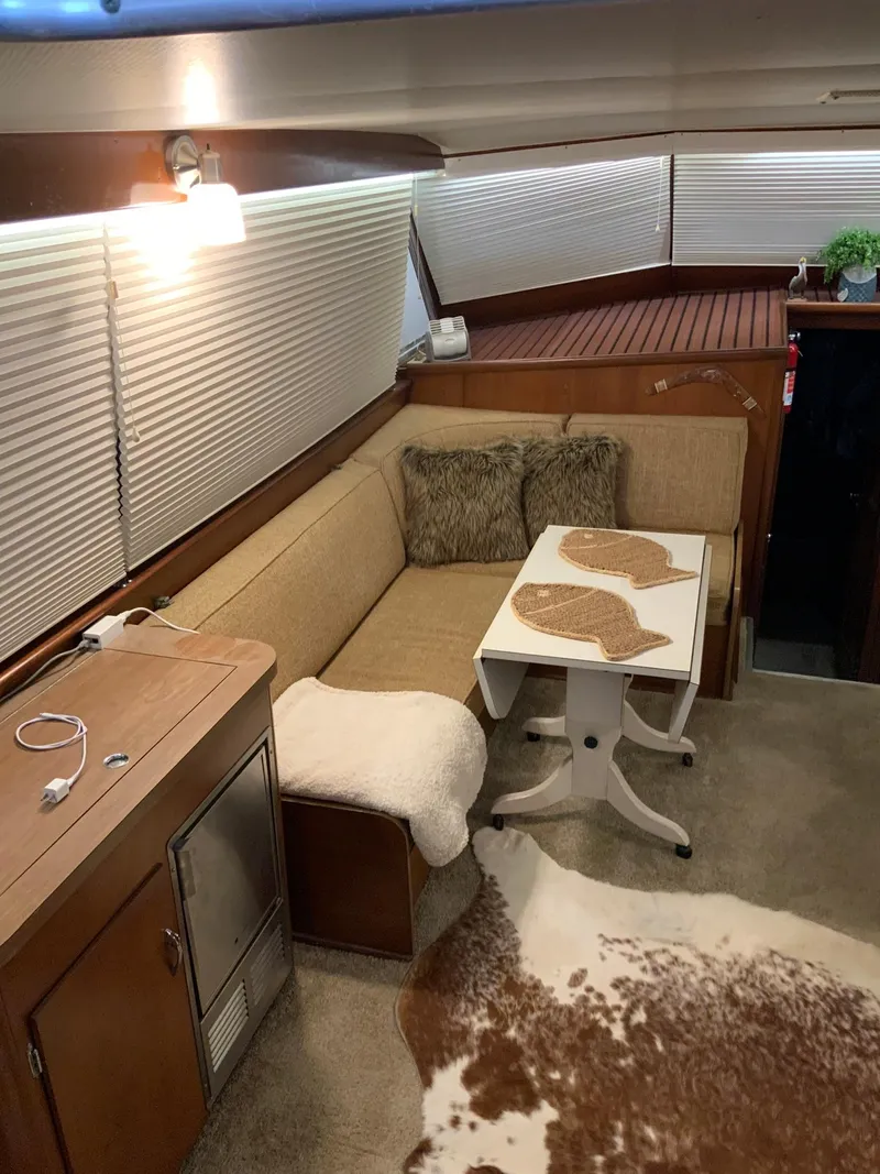 Slide: The Image of Interior of a 1969 Hatteras 41 Double Cabin with cozy seating area. - 35