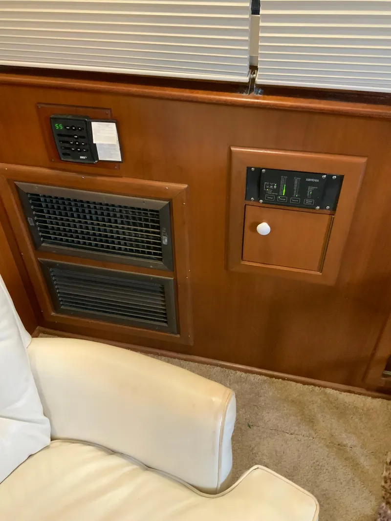 Slide: The Image of Control panel and vents inside a 1969 Hatteras 41 Double Cabin yacht. - 38