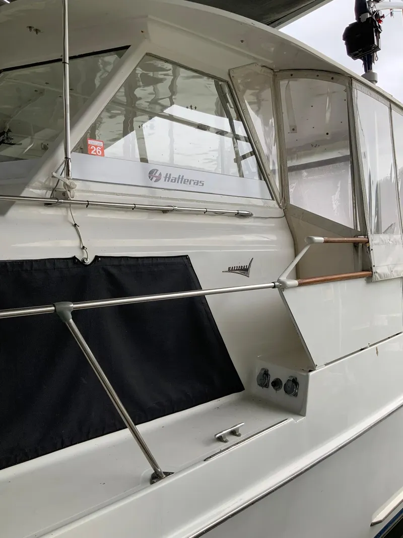 Slide: The Image of 1969 Hatteras 41 Double Cabin yacht, side view with cabin details. - 5