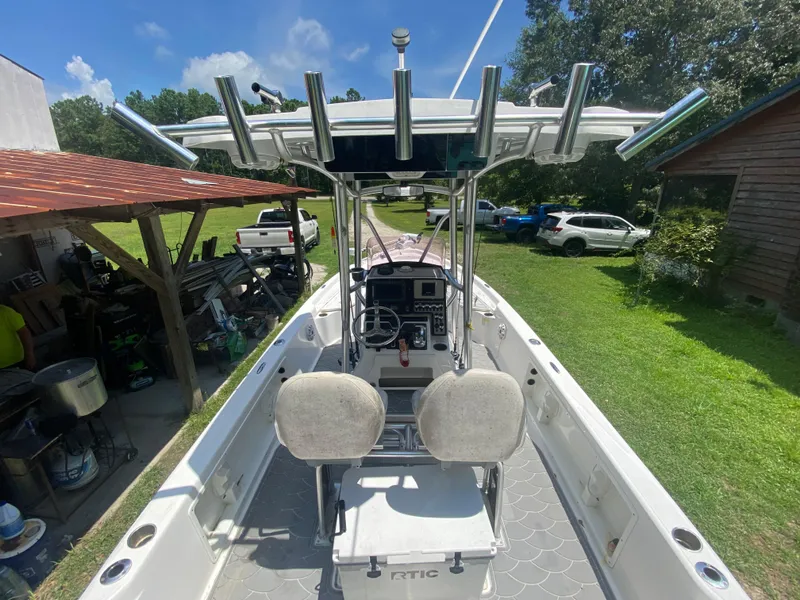 Slide: The Image of 2019 Blue Wave 2400 PureBay boat interior with console and seating. - 27