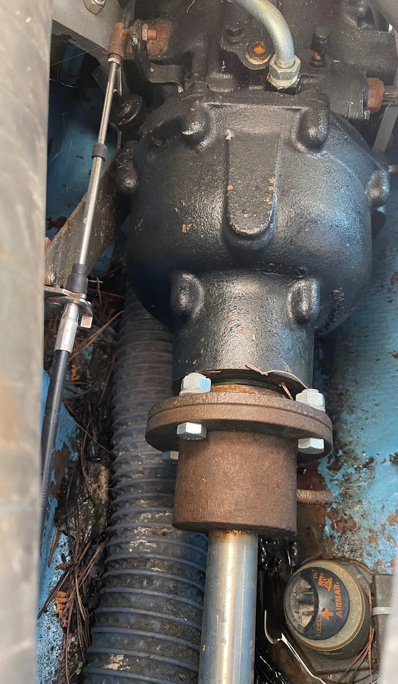 Slide: The Image of Close-up of the engine compartment of a 1976 SeaCraft 23 Classic boat. - 9