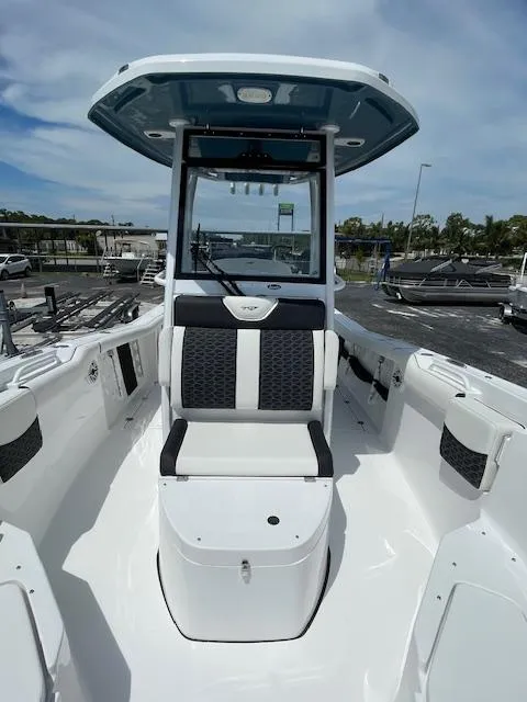 Slide: The Image of 2025 Tidewater 256 LXF boat with sleek seating and modern design. - 16