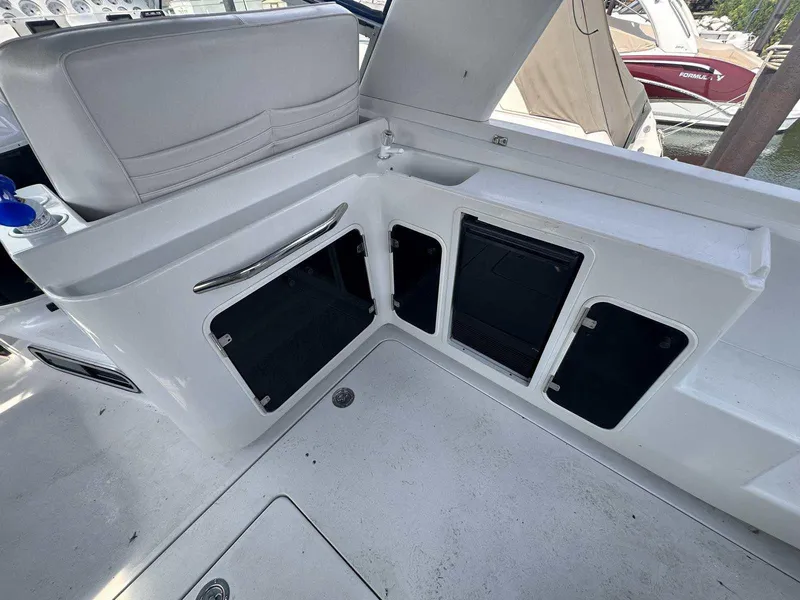Slide: The Image of Interior view of 1992 Four Winns 365 Express boat with storage compartments. - 9