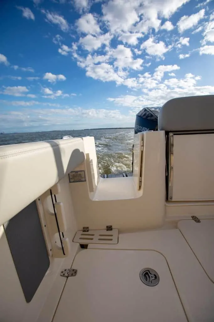 Slide: The Image of 2025 Scout 277 Dorado boat interior with ocean view and blue sky. - 9