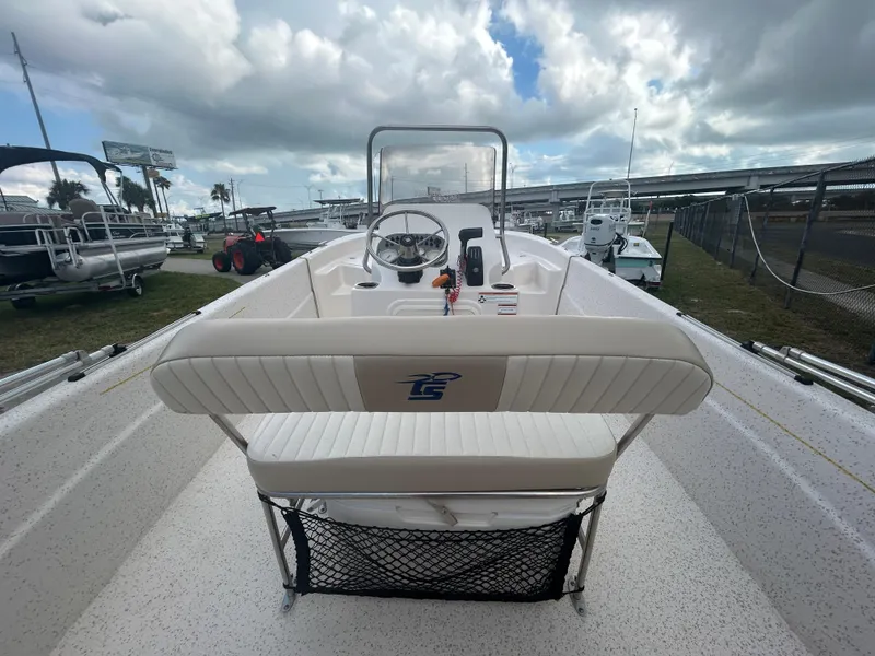 Slide: The Image of 2019 Carolina Skiff 198 DLV boat interior with steering console and seating. - 6