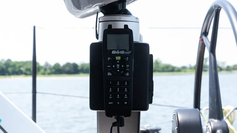 Slide: The Image of B&G marine radio on Custom Current Marine 46 yacht, 2022 model, with scenic water backdrop. - 18