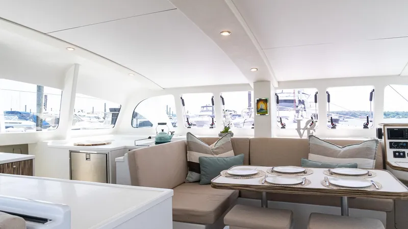Slide: The Image of Luxurious interior of 2022 Custom Current Marine 46 yacht with elegant dining area. - 20