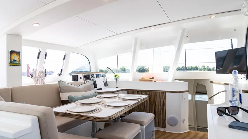 Slide: The Image of Luxurious interior of 2022 Custom Current Marine 46 yacht with elegant dining area. - 25