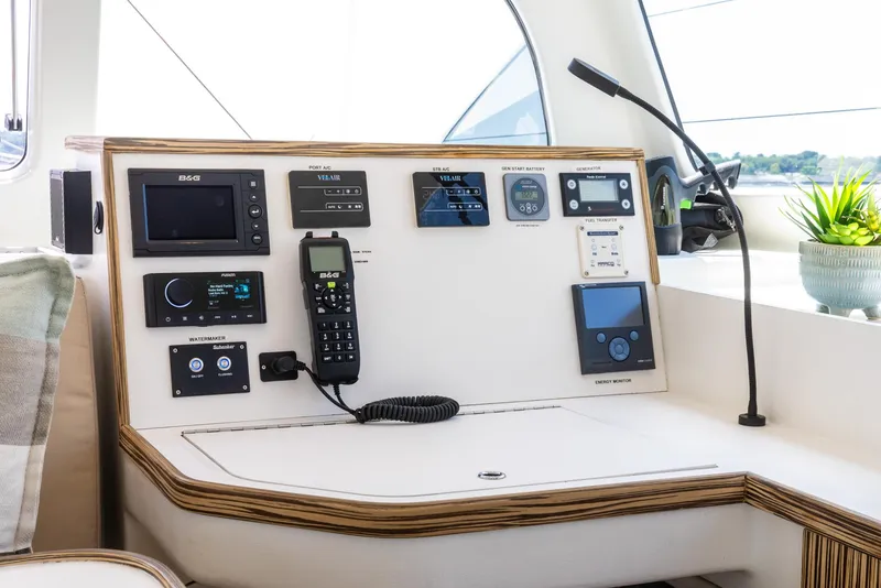 Slide: The Image of Control panel of 2022 Custom Current Marine 46 yacht with navigation and communication equipment. - 26
