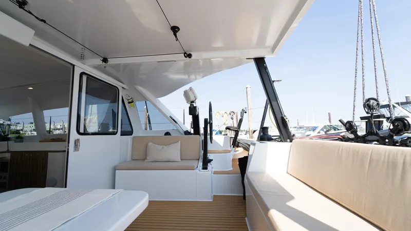 Slide: The Image of Spacious deck of 2022 Custom Current Marine 46 yacht with comfortable seating. - 4