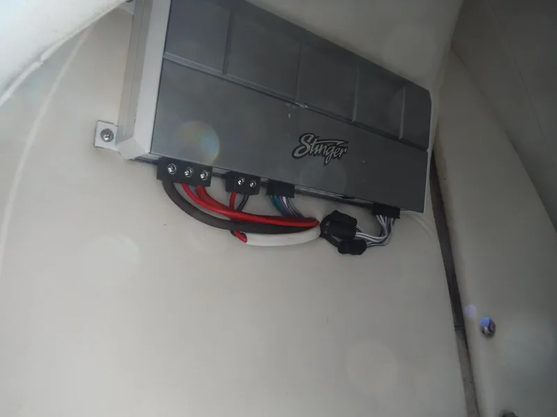 Slide: The Image of Amplifier installation in 1999 Baja 29 Outlaw boat interior. - 27