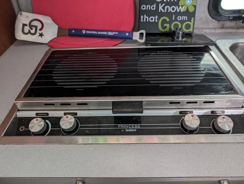 Slide: The Image of 1987 Cruisers 3370 Esprit boat kitchen with Princess by Seaward stove. - 10