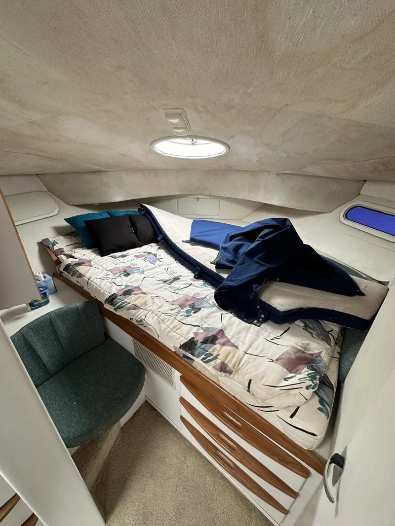 Slide: The Image of 1997 Chris-Craft 380 Continental B cabin interior with bed and seating. - 20