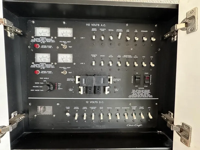 Slide: The Image of Electrical control panel of a 1997 Chris-Craft 380 Continental B boat. - 21