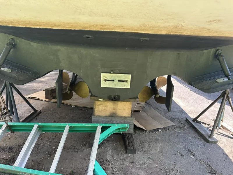 Slide: The Image of 1997 Chris-Craft 380 Continental B boat hull and propellers on dry dock. - 3