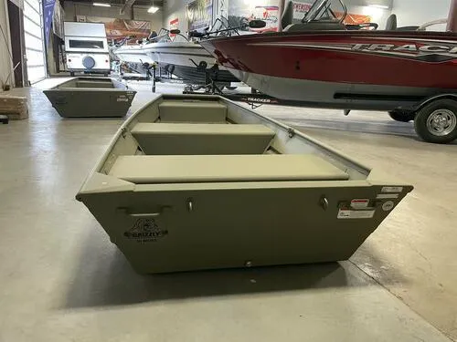 Slide: The Image of 2024 Tracker Grizzly 1236 Jon boat in showroom. - 4