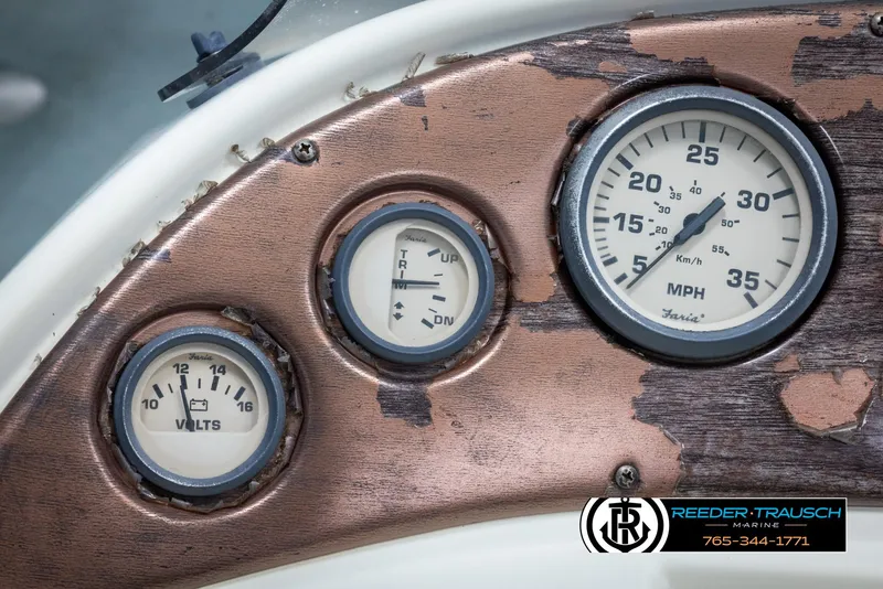Slide: The Image of Close-up of 2002 Suncruiser Trinidad 224 boat dashboard with gauges. - 30