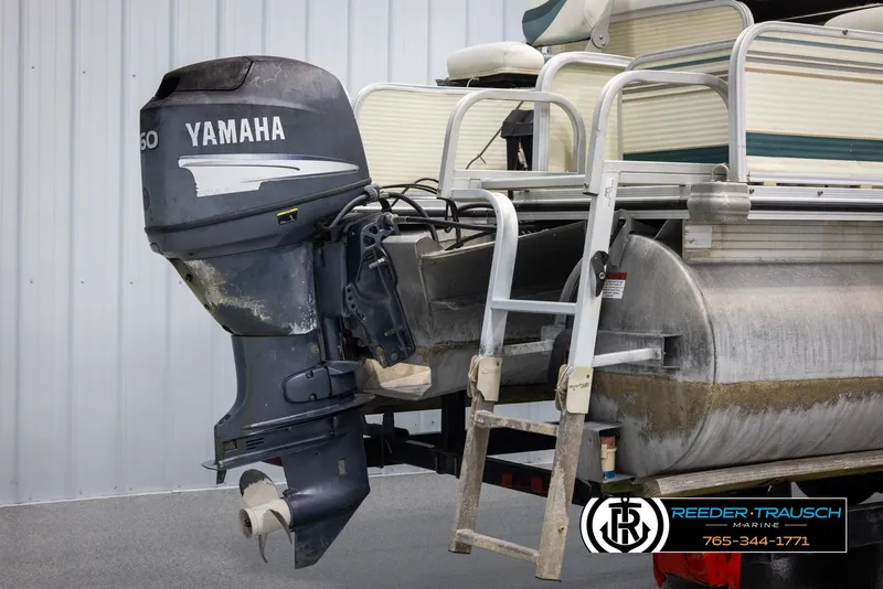 Slide: The Image of 2002 Suncruiser Trinidad 224 pontoon boat with Yamaha outboard motor. - 39