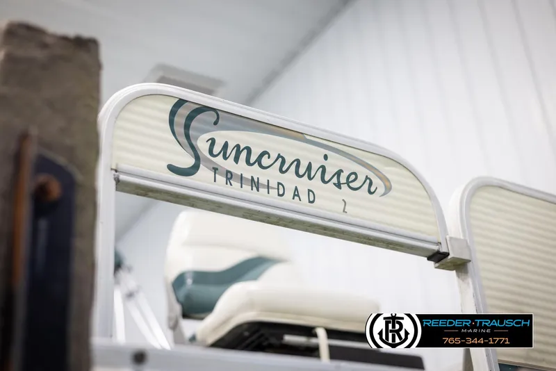 Slide: The Image of 2002 Suncruiser Trinidad 224 boat with seating, Reeder-Trausch Marine contact info. - 43