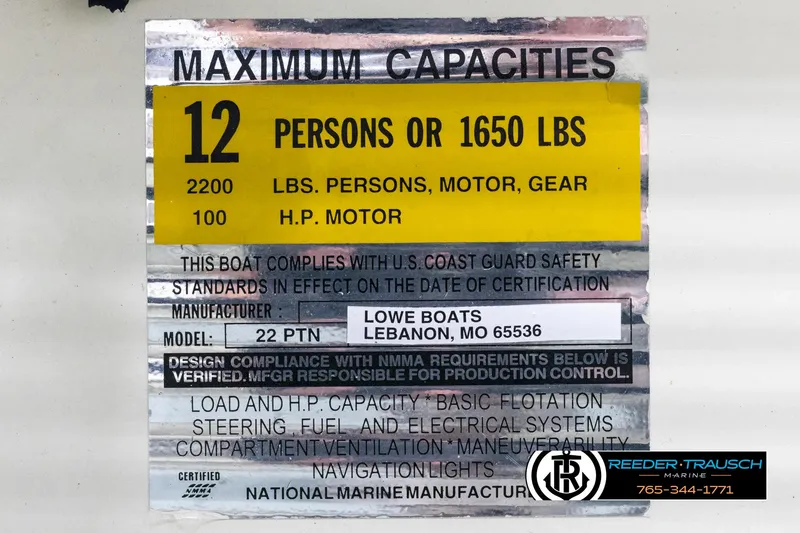 Slide: The Image of 2002 Suncruiser Trinidad 224 capacity label: 12 persons or 1650 lbs, 100 HP motor. - 47