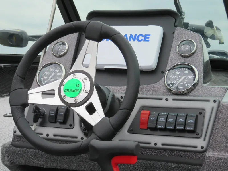 Slide: The Image of 2024 Ranger VS1782SC Angler boat dashboard with steering wheel and instrument panel. - 3