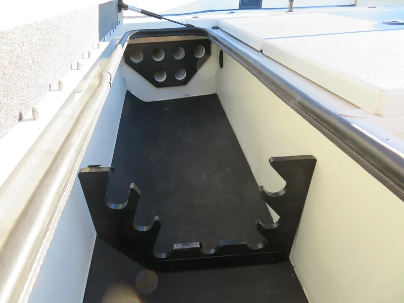Slide: The Image of 2024 Ranger RB200 boat rod storage compartment. - 10