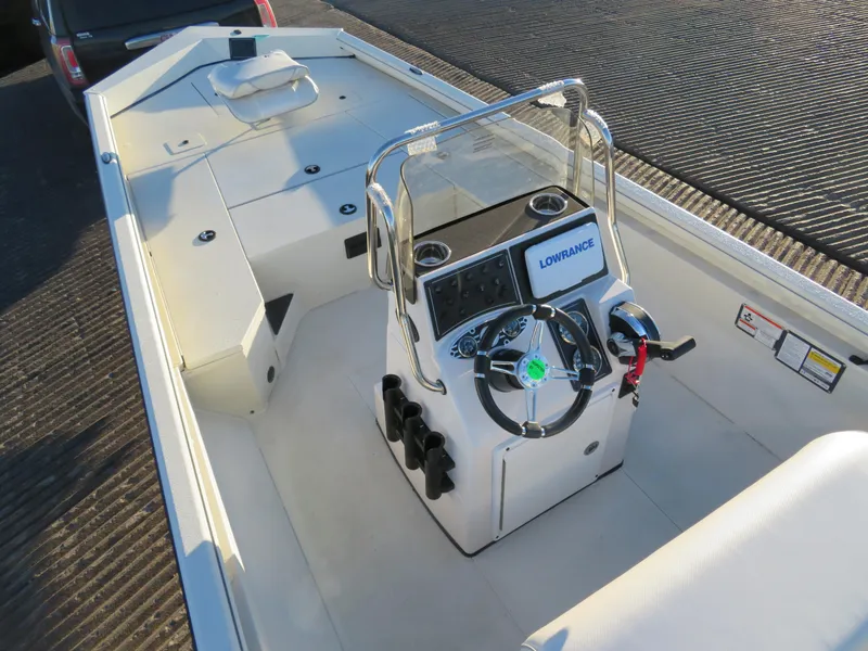 Slide: The Image of 2024 Ranger RB200 boat interior with console and steering wheel. - 16