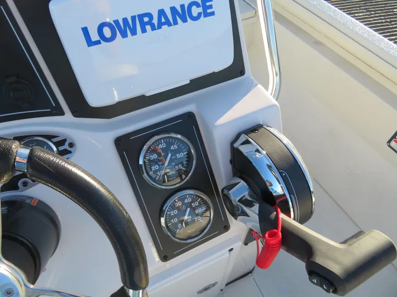 Slide: The Image of 2024 Ranger RB200 boat dashboard with Lowrance display and control panel. - 5