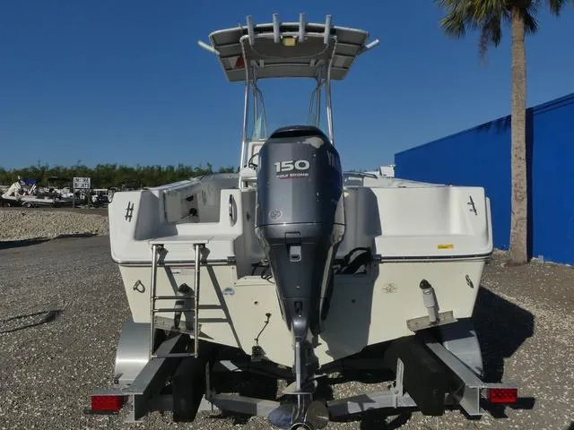 Slide: The Image of 2011 Sailfish 218 CC boat with Yamaha 150 engine on trailer. - 10