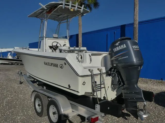 Slide: The Image of 2011 Sailfish 218 CC boat with Yamaha 150 engine on trailer. - 11