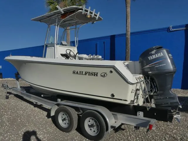 Slide: The Image of 2011 Sailfish 218 CC boat on trailer with Yamaha outboard motor. - 12