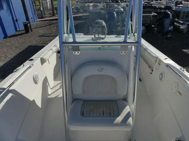 Slide: The Image of 2011 Sailfish 218 CC boat interior with seating and console. - 18