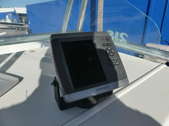 Slide: The Image of Garmin marine GPS device on 2011 Sailfish 218 CC boat dashboard. - 26