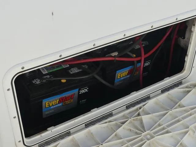 Slide: The Image of EverStart marine batteries in 2011 Sailfish 218 CC boat compartment. - 35
