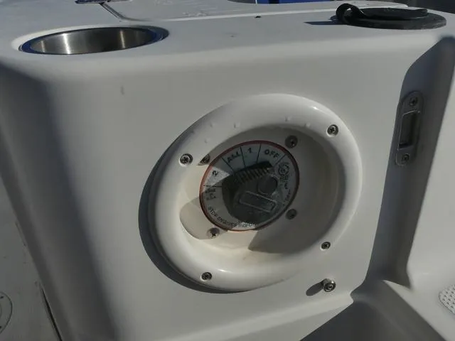 Slide: The Image of Close-up of a 2011 Sailfish 218 CC boat control panel. - 39