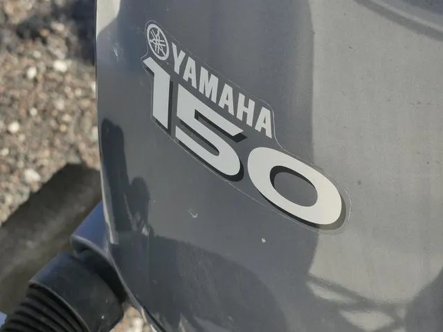 Slide: The Image of Yamaha 150 outboard motor on 2011 Sailfish 218 CC boat. - 40