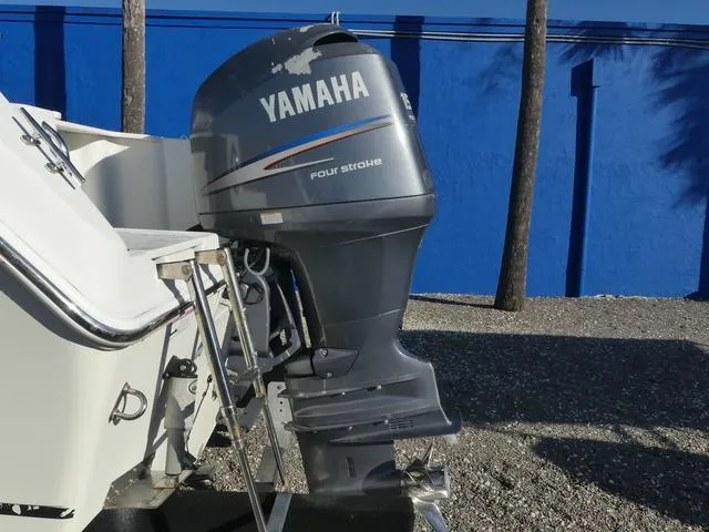 Slide: The Image of Yamaha four-stroke outboard motor on 2011 Sailfish 218 CC boat. - 42