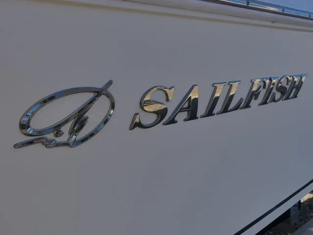 Slide: The Image of 2011 Sailfish 218 CC boat logo on white hull. - 45