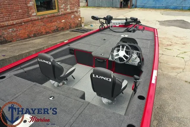 Slide: The Image of 2024 Lund 1875 Renegade SS fishing boat with dual seats and steering console. - 11