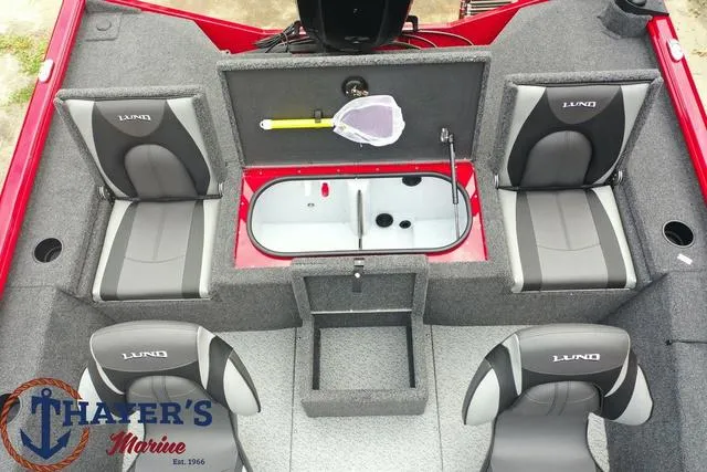 Slide: The Image of 2024 Lund 1875 Renegade SS boat interior with seating and storage compartments. - 14
