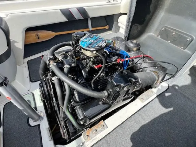 Slide: The Image of 1992 Sea Ray Ski Ray boat engine compartment with visible engine components. - 13