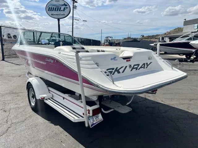 Slide: The Image of 1992 Sea Ray Ski Ray boat on trailer at Wolf MasterCraft dealership. - 8